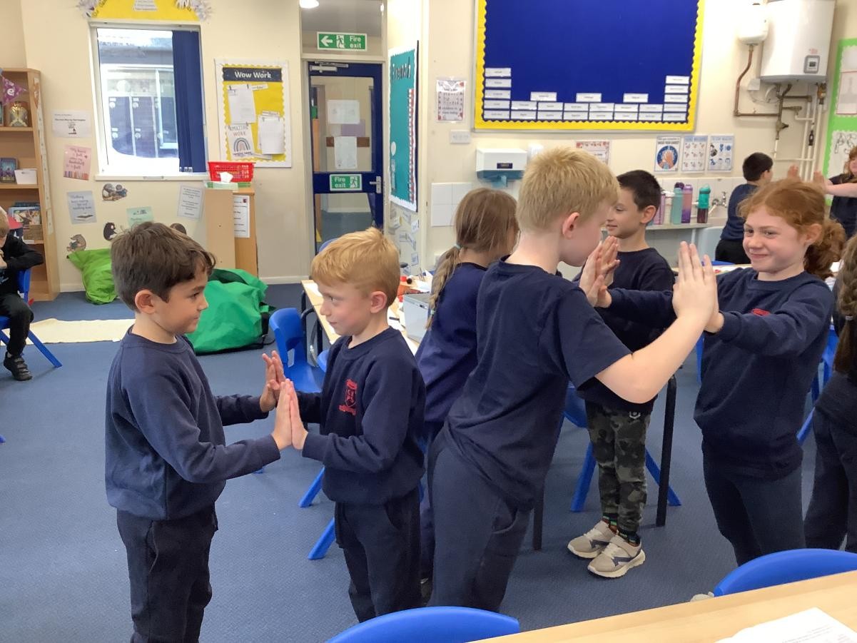 To test balanced and unbalanced forces, we worked in groups to push and pull different objects. We even tested our strength against others.