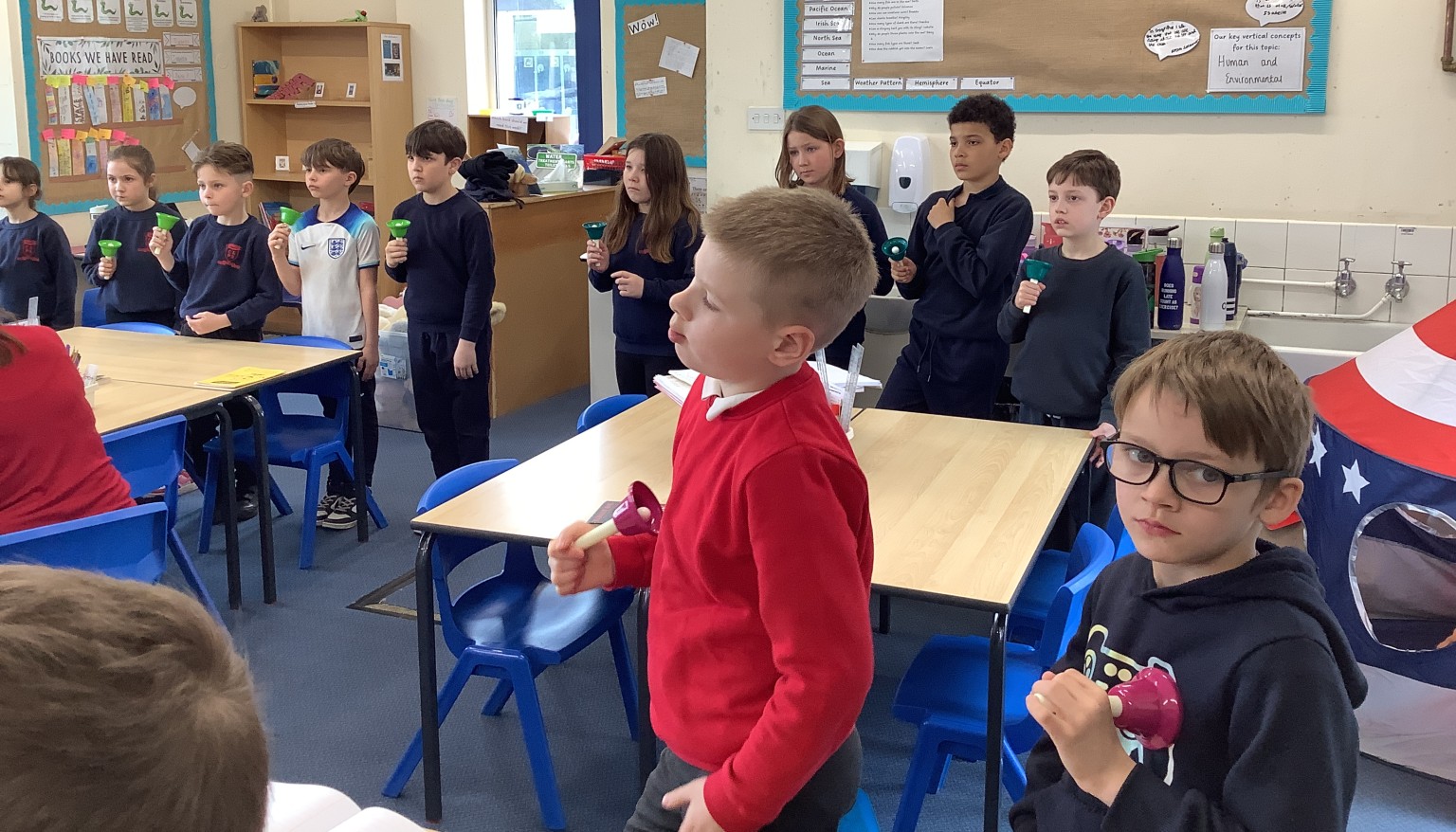 Playing the handbells in Music