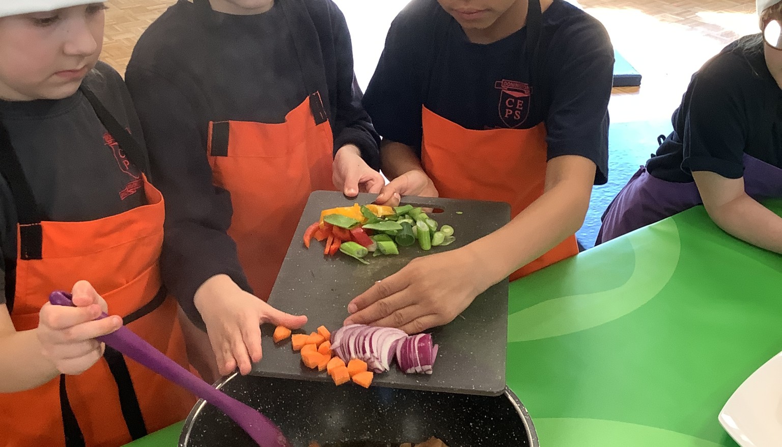 We enjoyed cooking during our Roots to Food experience!