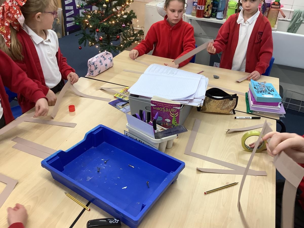 We enjoyed learning about different joining techniques in DT! These included tape, staples, glue and split pins.