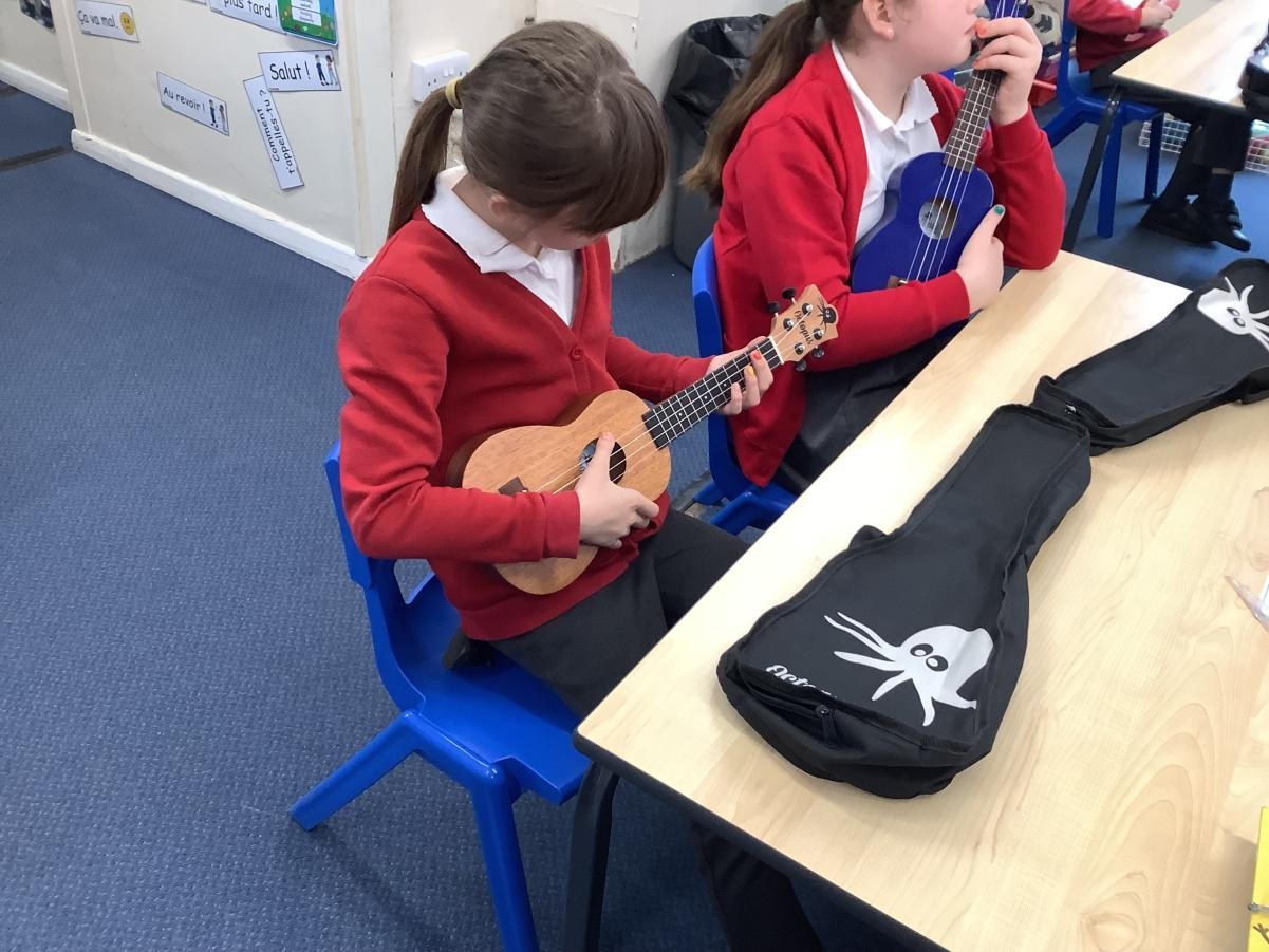 In music, we have been learning the Ukulele! We have learnt the chords C major and A minor so far!