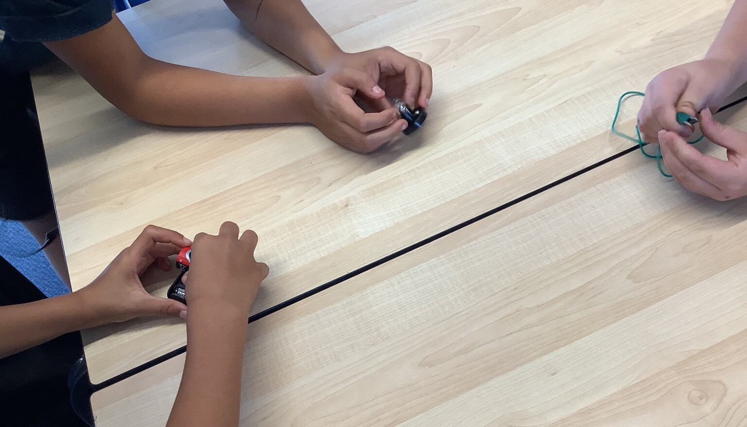 In DT, we built electrical circuits to support our understanding of electrical systems.