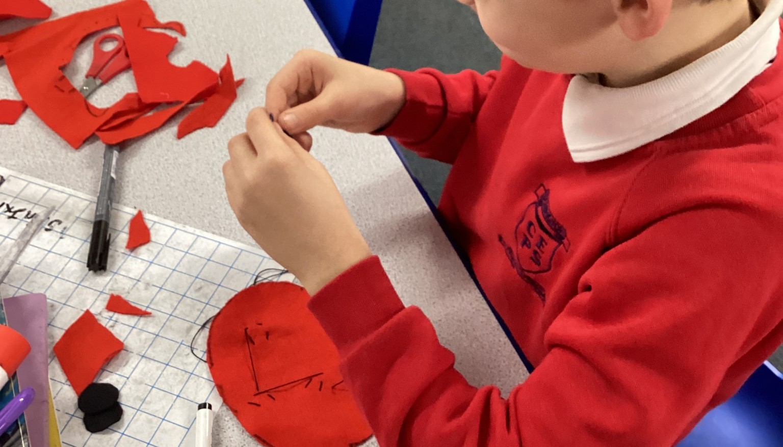 Sewing soft toys for book bags for nursery.