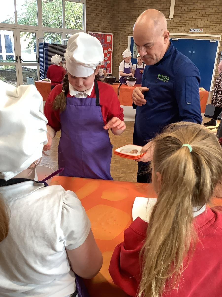 We enjoyed our Roots to Food cooking workshop where we worked as a team to slice, peel, chop and mix. The food we made was delicious!