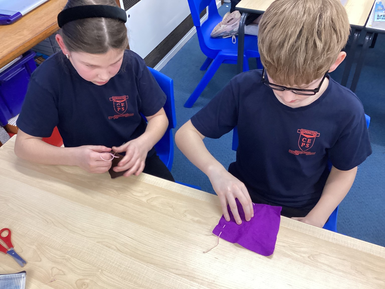 DT - We practised sewing techniques.