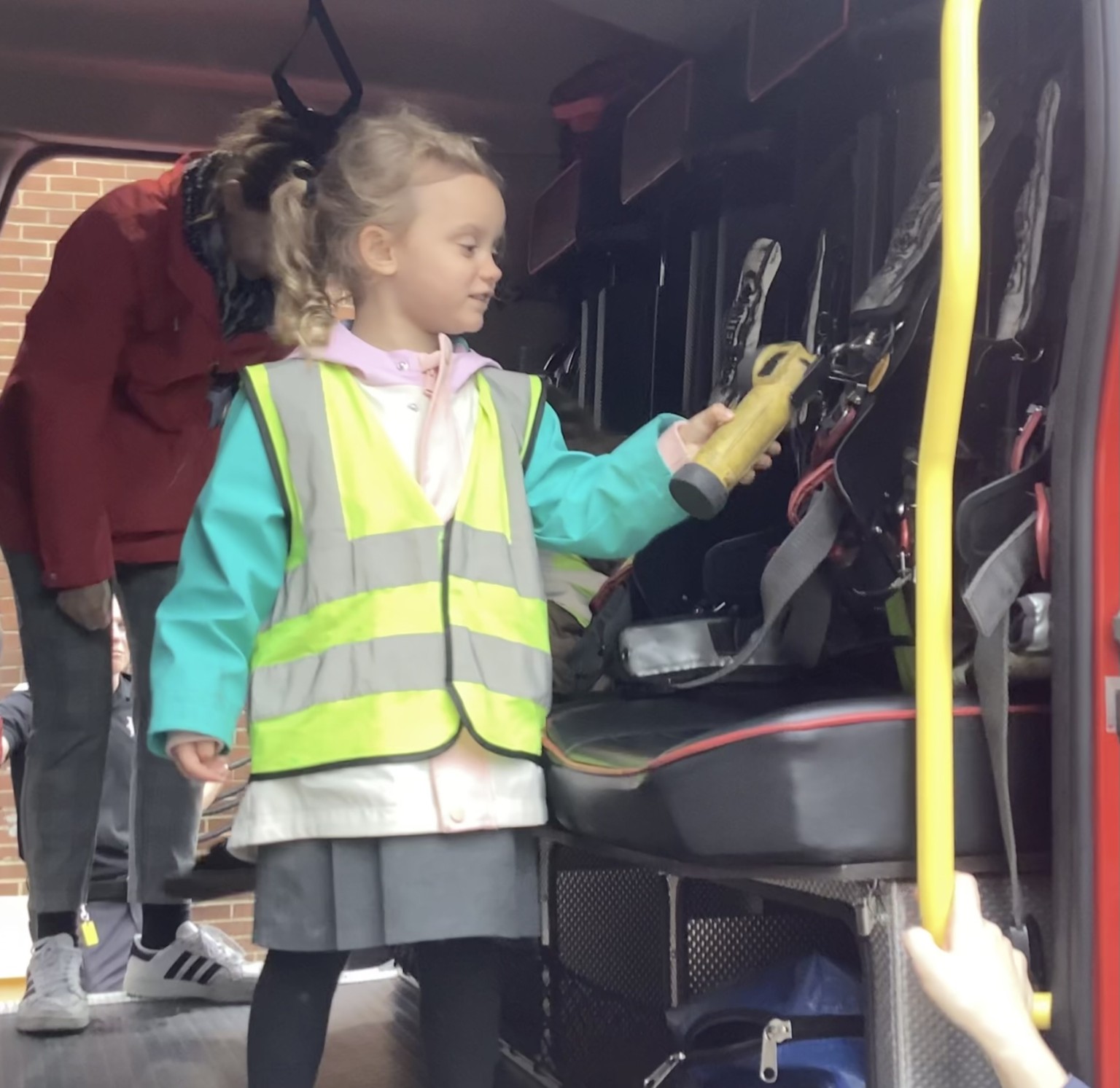 Lily found a tourch attached to the breathing appartus. 