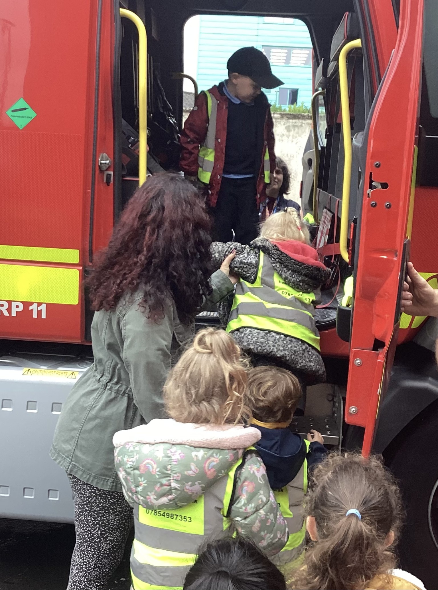 We got to have a look inside the fire engine and seeing what is kept inside and on the seats.