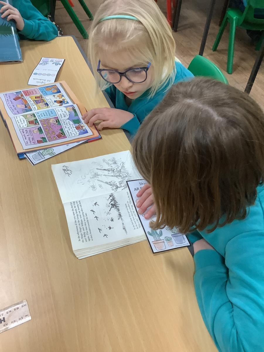 We listen to younger children read.