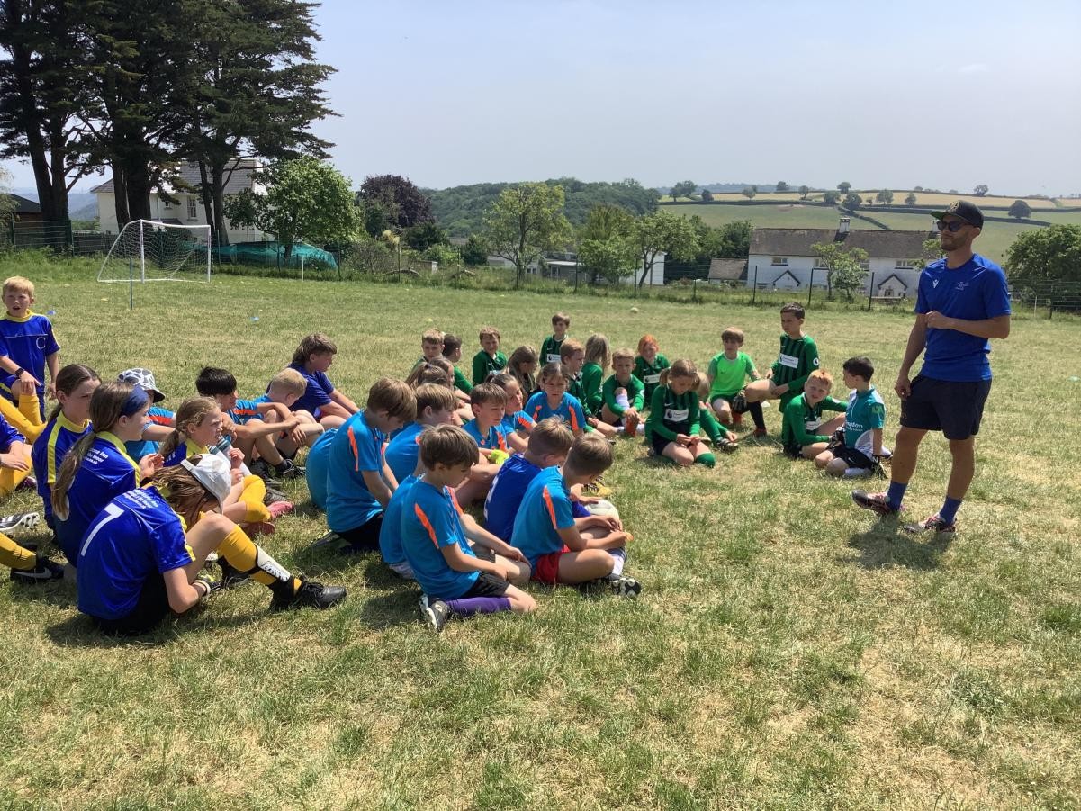 Ilsington hosts inter- school football matches with mixed sex teams enjoying football fun together.