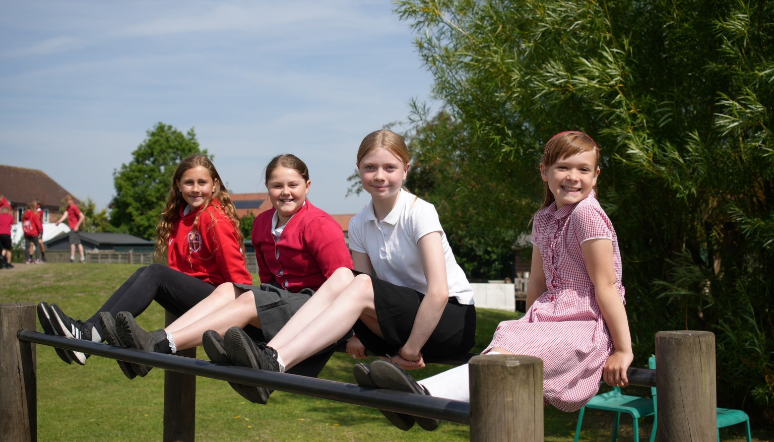 Children balancing on a trim trail