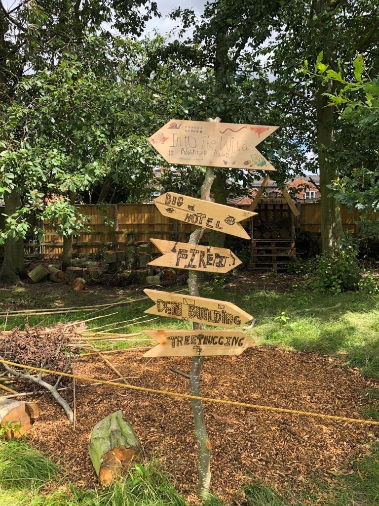 Which way to Den Building?