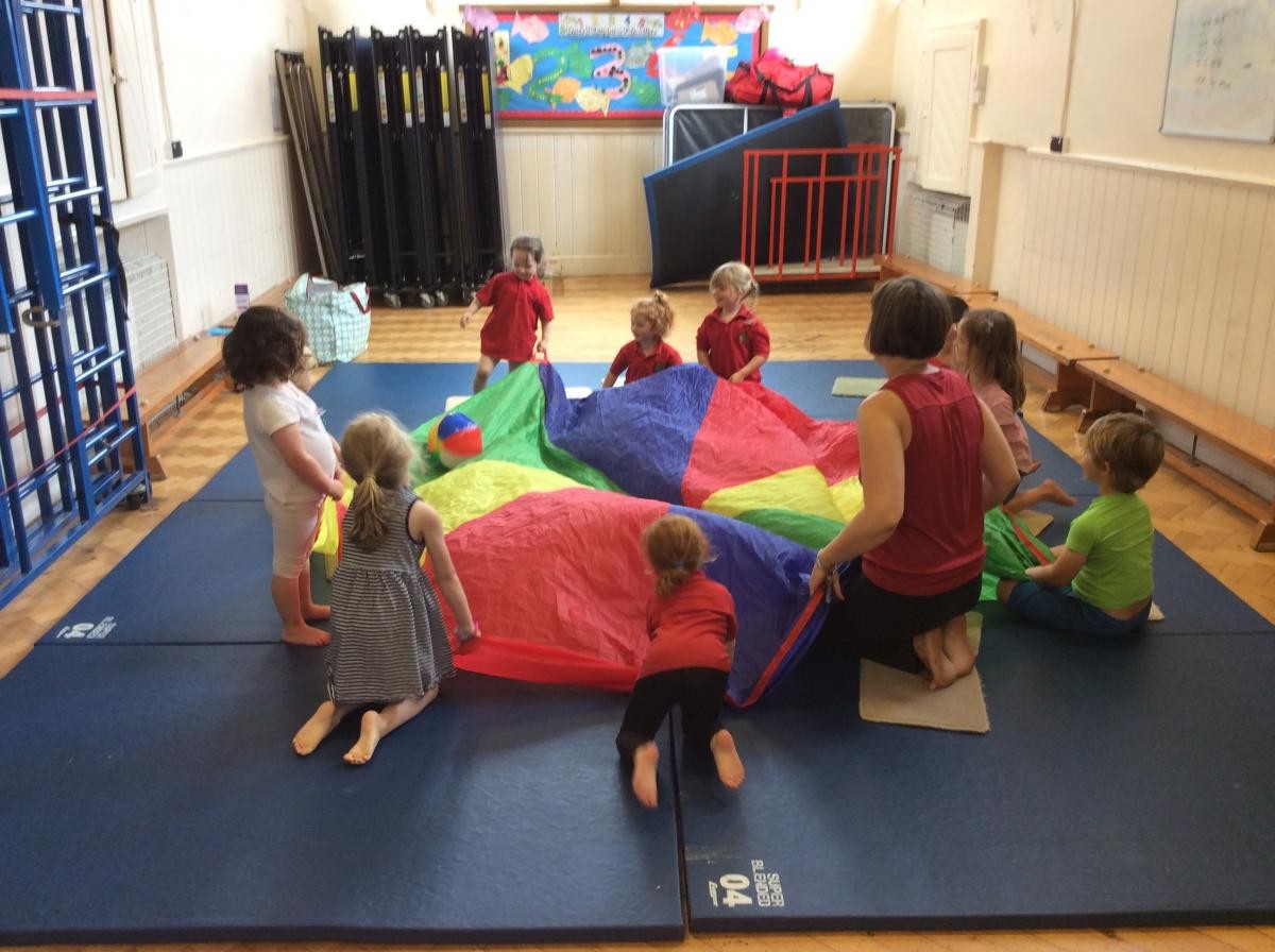 Parachute fun during our yoga session