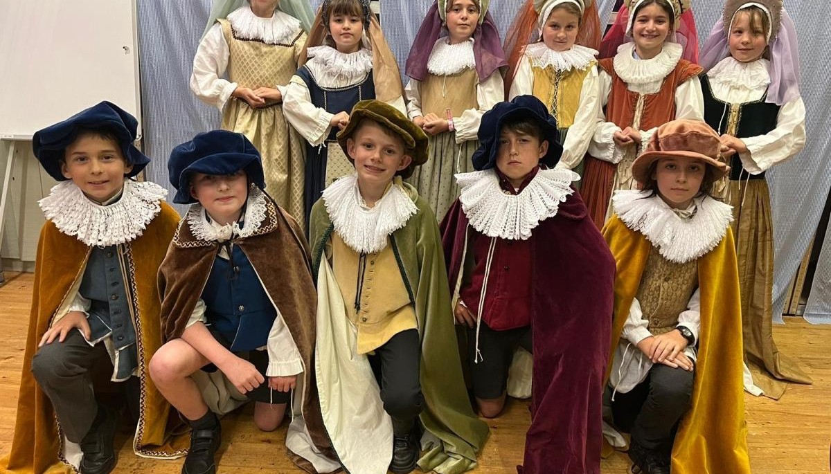 Children dressed up in historic outfits