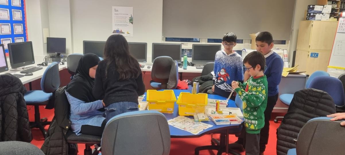 Carefully crafting a clever creation.