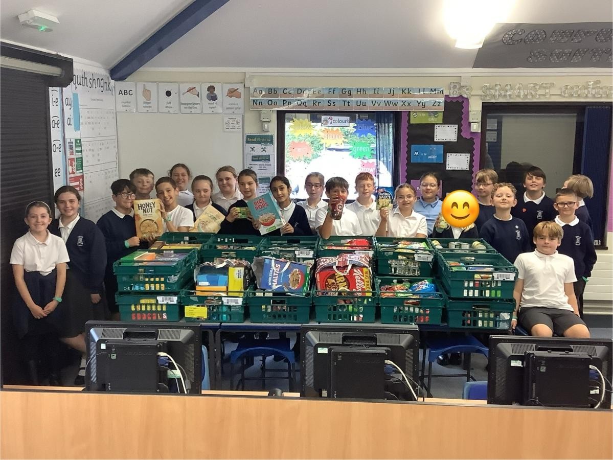 Year 6 stacked the crates...20 in total plus some extra bags too.  THANK YOU!