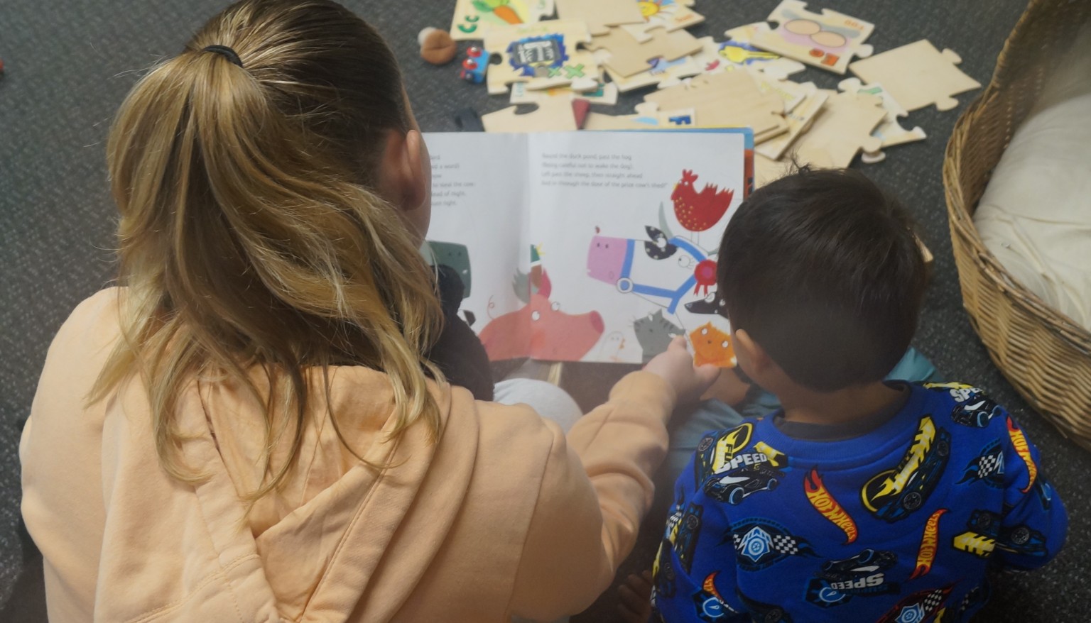 Adult and child reading