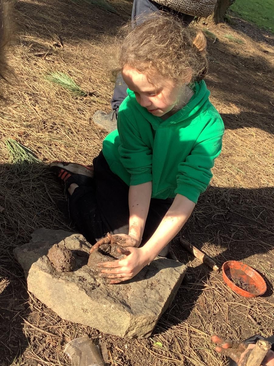 Pottery with clay-like soil.