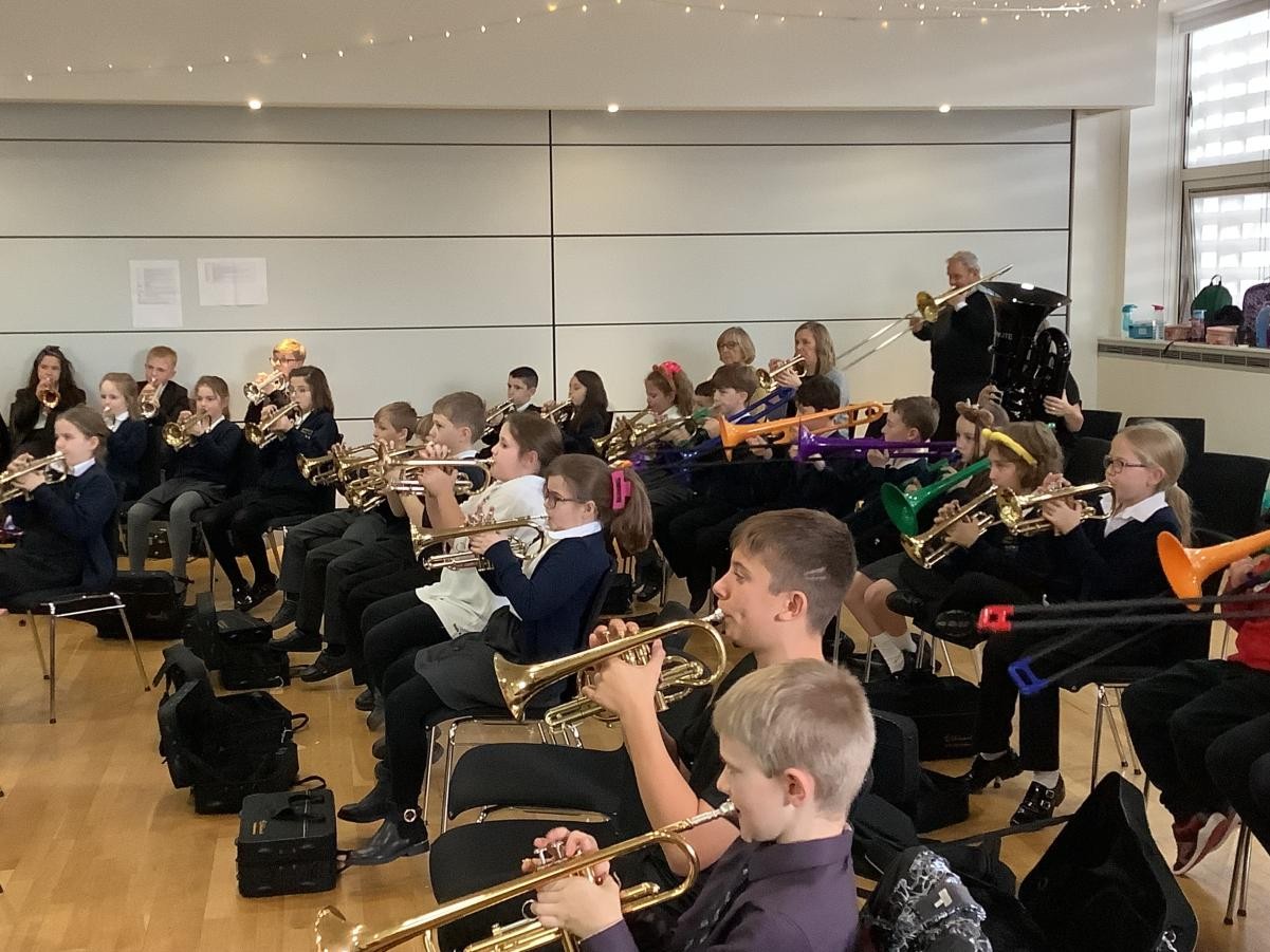 Year 4 and year 5 miniband rehearsing at the Sage