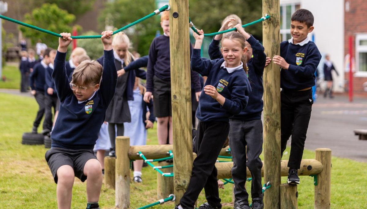 group of children on a trim trail 