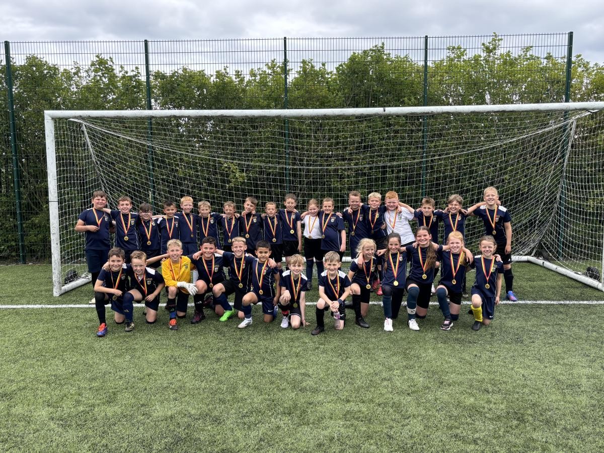 Children from Year 3 and Year 4 taking part in an English Schools FA football festival