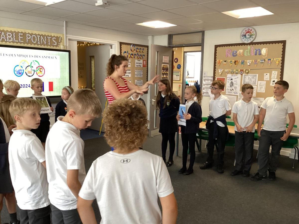 A workshop in year 3 last year prior to enjoying a fully French theatre show, 'Les Animaux Olympiques' from 'Theatre sans frontieres'