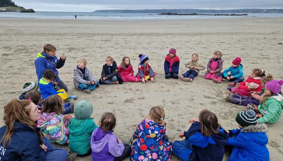 Group talk on the beach