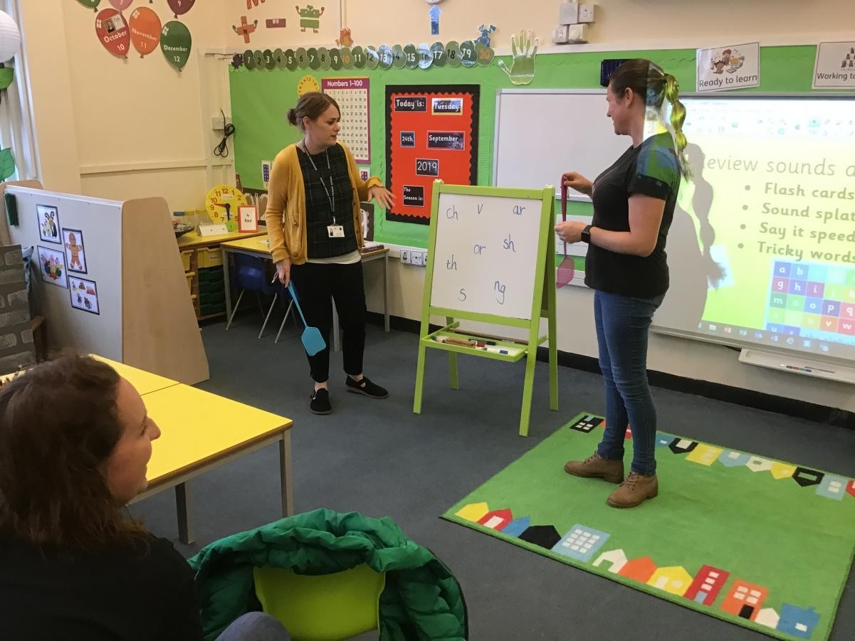 Parent workshops -  showing how they can help their children with phonics and early reading.