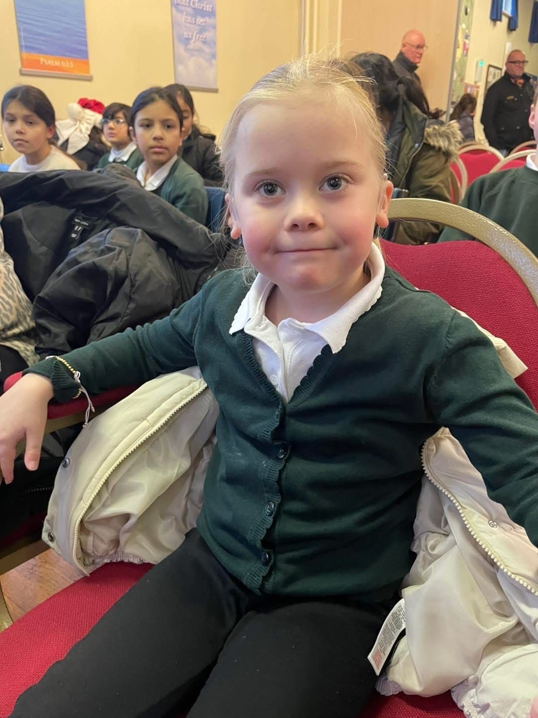 Ella waiting for the service to begin