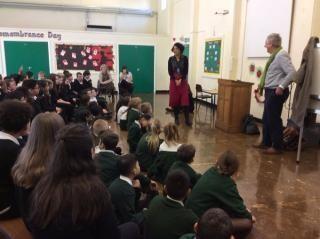 Councillor Rob Higgins and Local MP Chi Onwurah presenting to the children