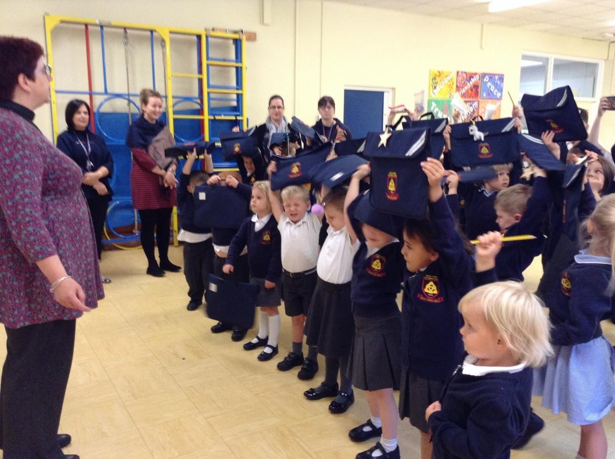 Start of term, blessing book bags