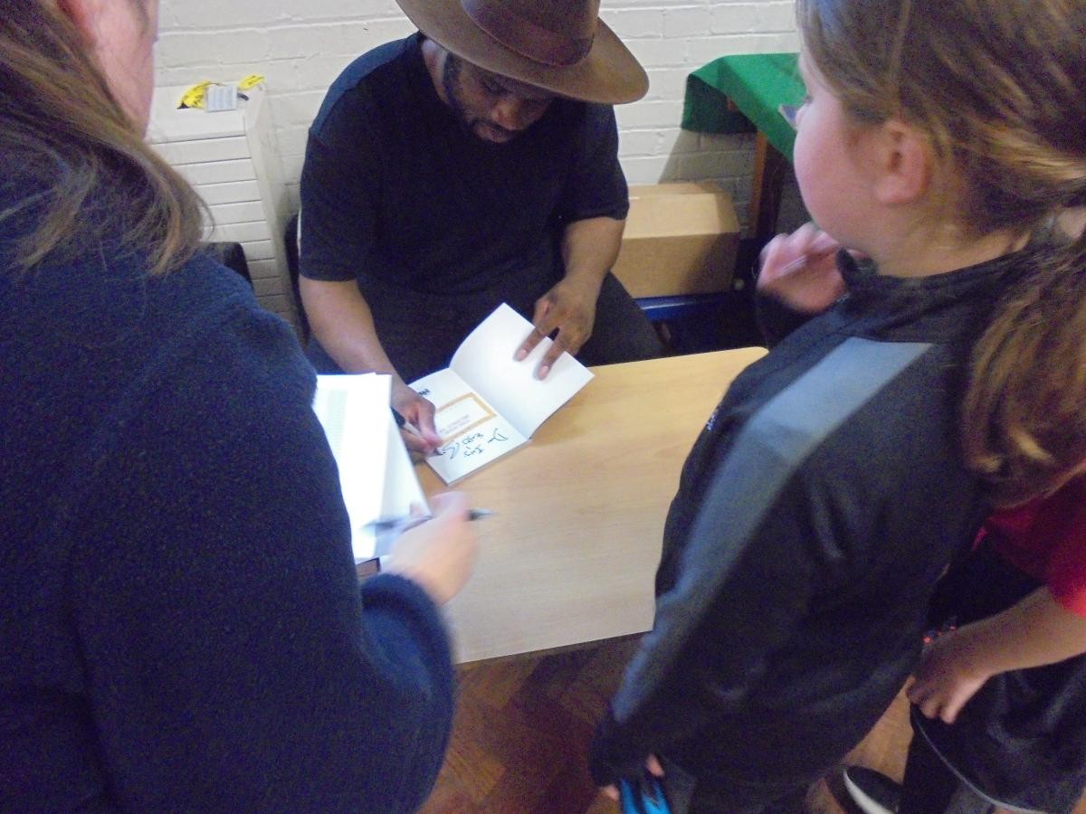 Author and Britain's Got Talent Star signing books for our pupils!