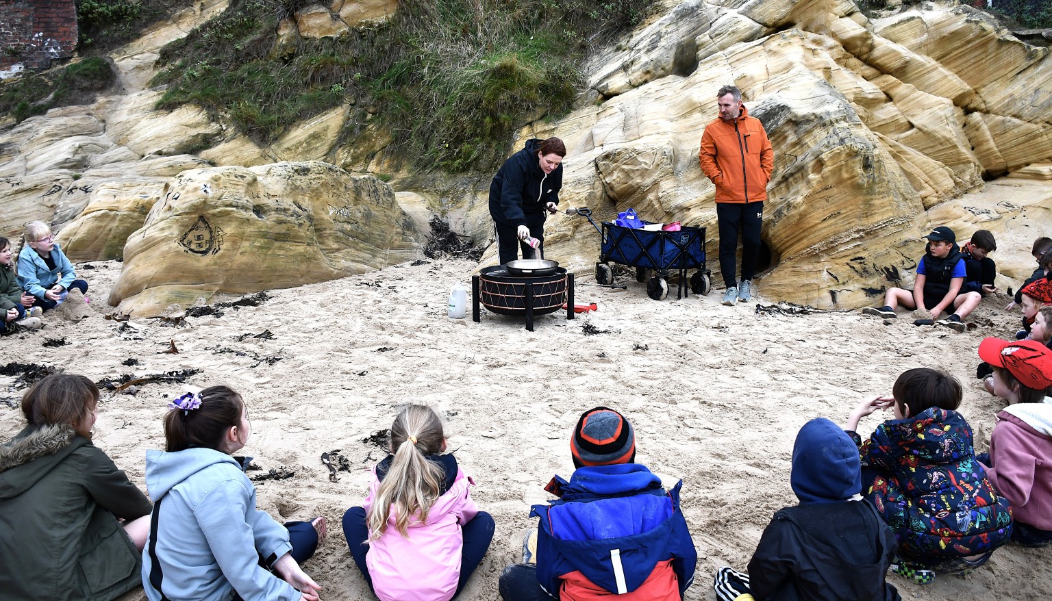 Cooking arouond a beach fire