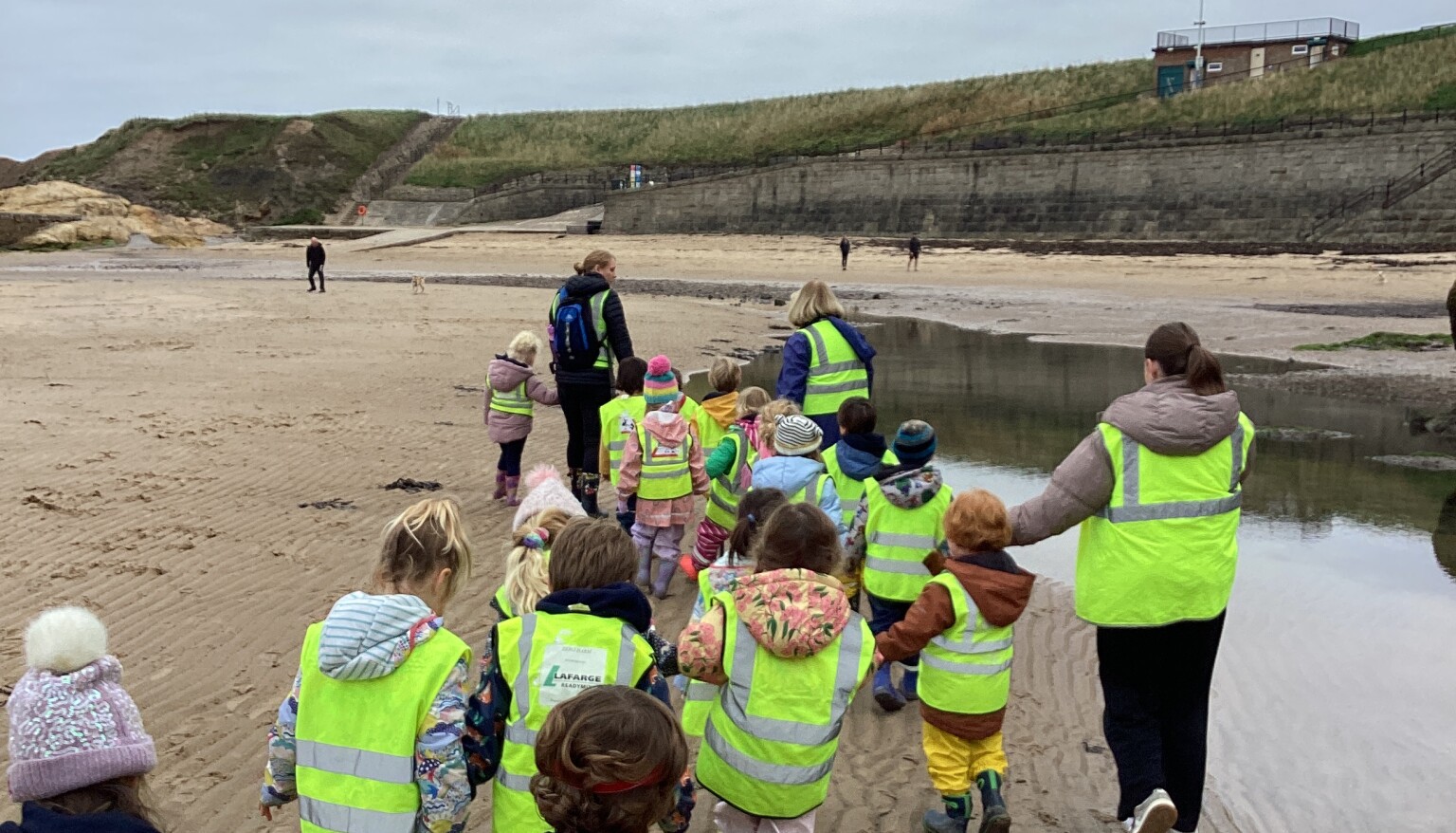 children walking on the beach