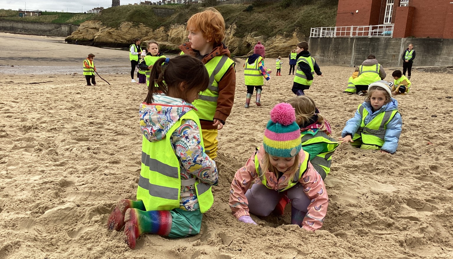 children playing in the sand
