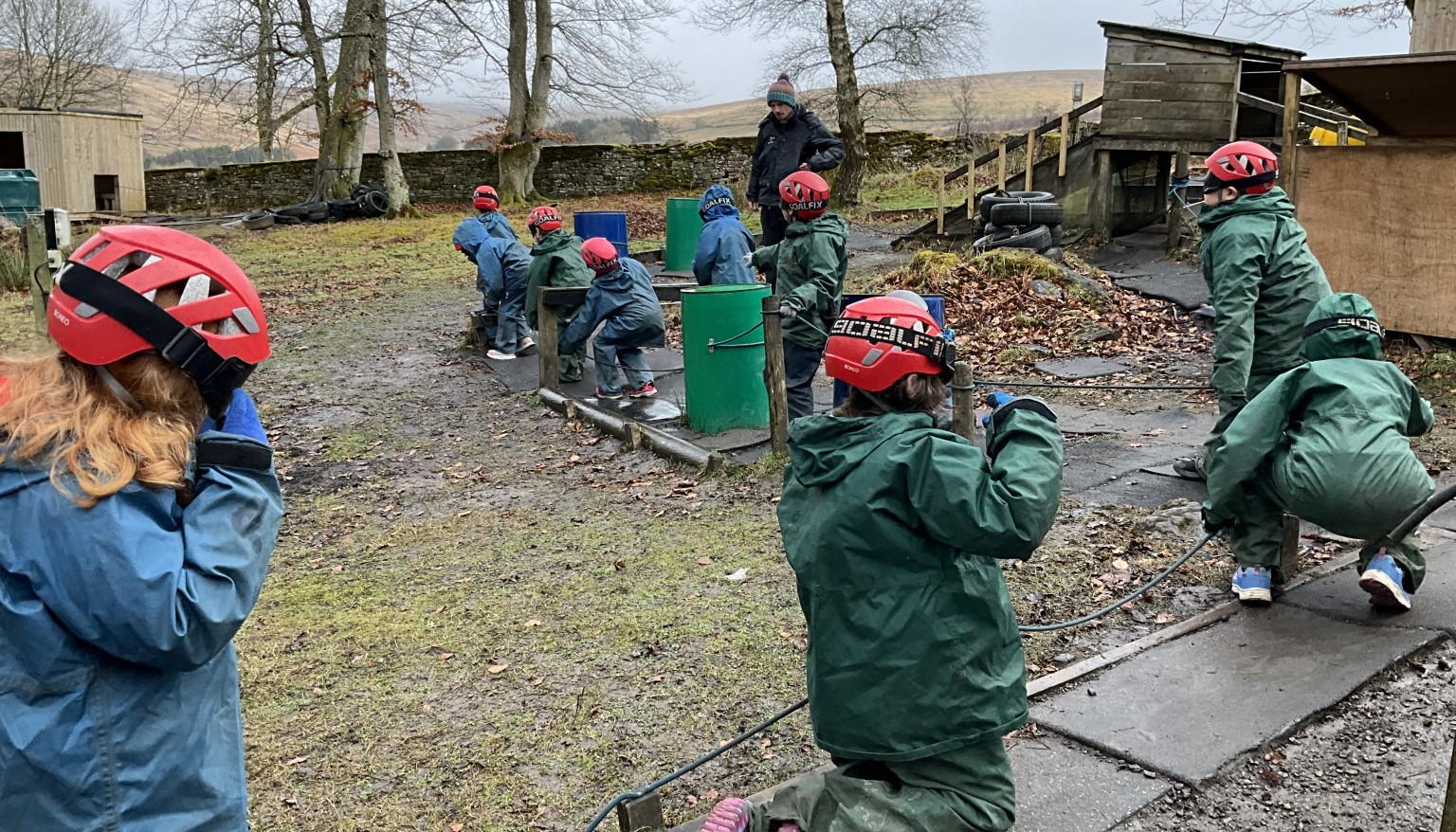 Children taking part in outdoor obstacle 