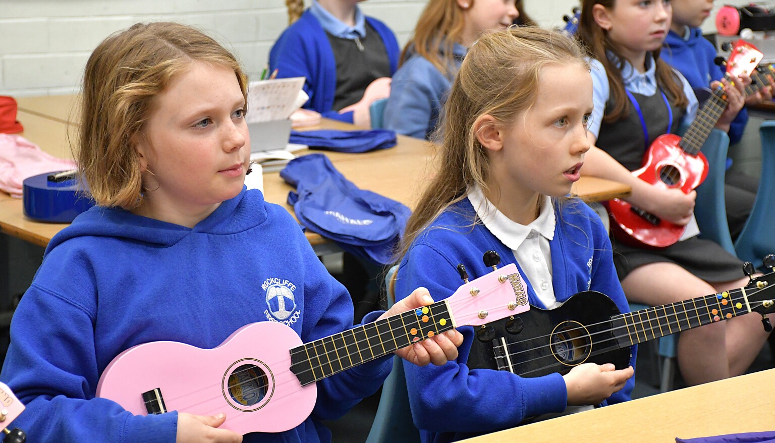 children playing ukelele