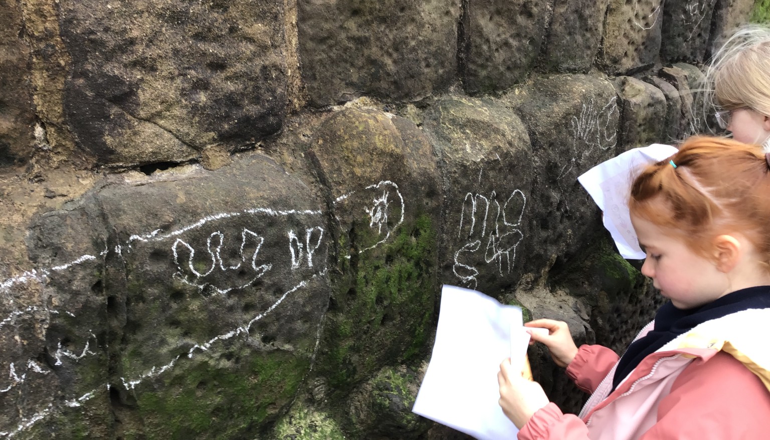 children doing stone age art