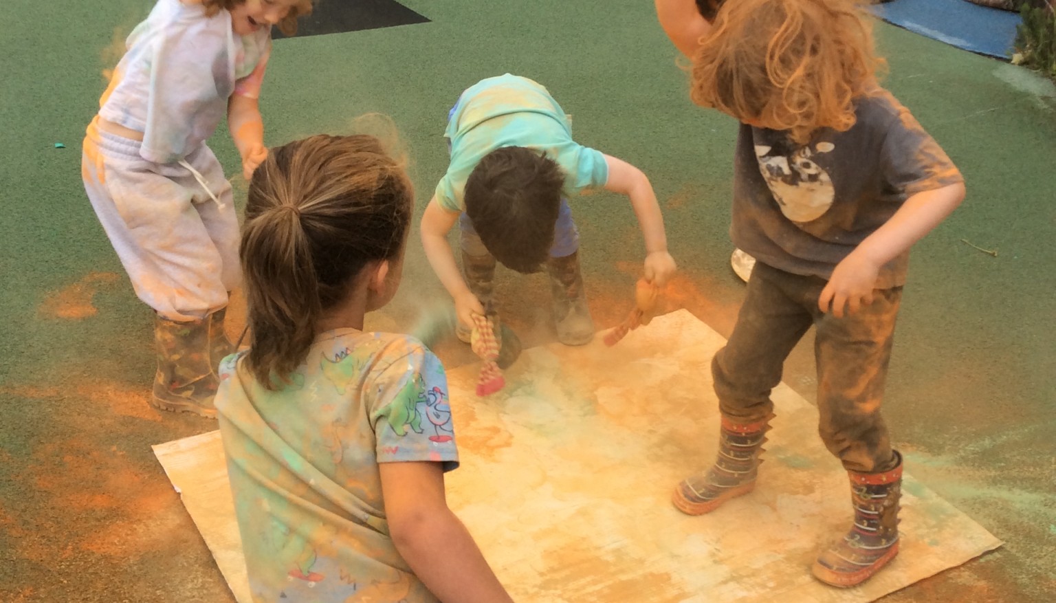 childen jumping in powder 