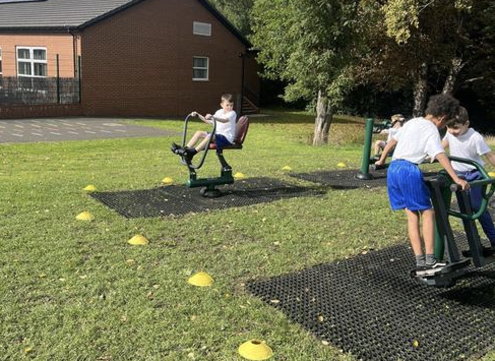 Pupils on the outdoor gym equipment