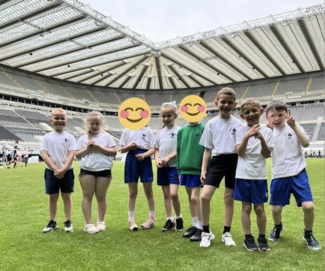 Smiling pupils at St James' Park