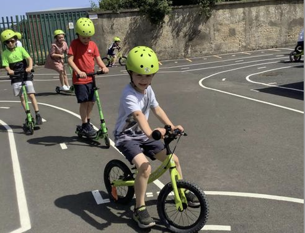 Pupils on scooter track