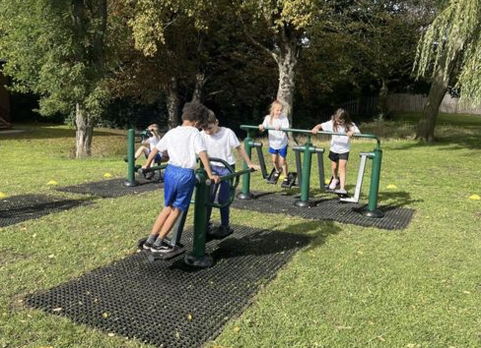 Pupils on the outdoor gym equipment