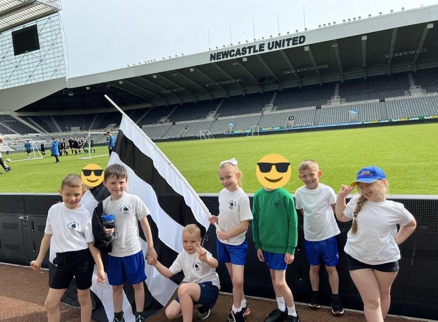 Smiling pupils at St James' Park