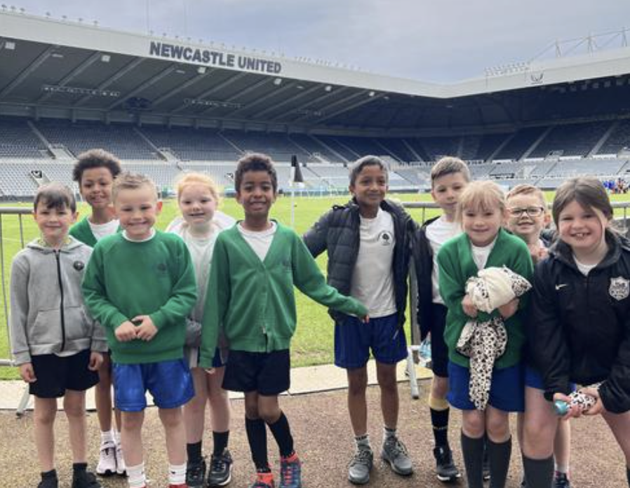 Smiling pupils St James' Park