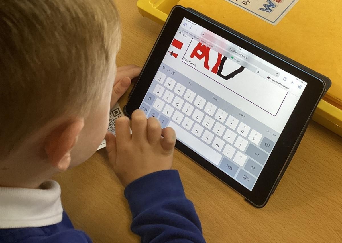 After using ‘Magic Badge’ to log onto Purple Mash, we drew a picture then added text. 