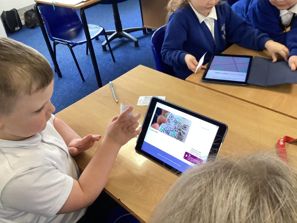 After using ‘Magic Badge’ to log onto Purple Mash, we drew a picture then added text. 