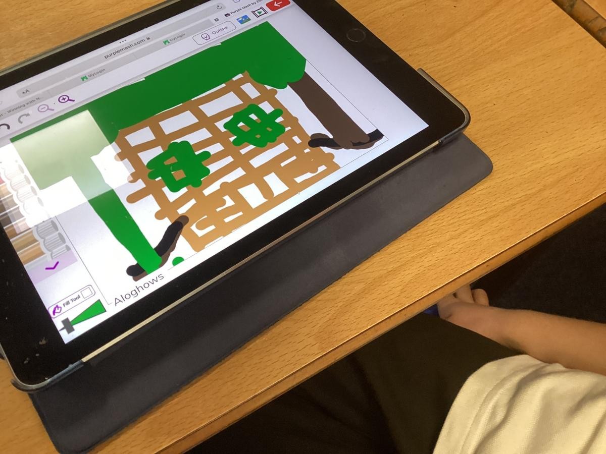 After using ‘Magic Badge’ to log onto Purple Mash, we drew a picture then added text. 