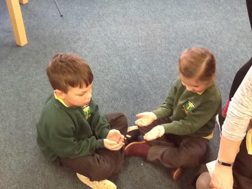 We showed care for each other by massaging a partner's hands.