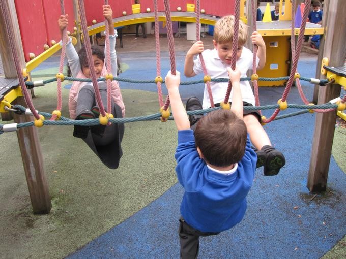 Children climbing on equipment