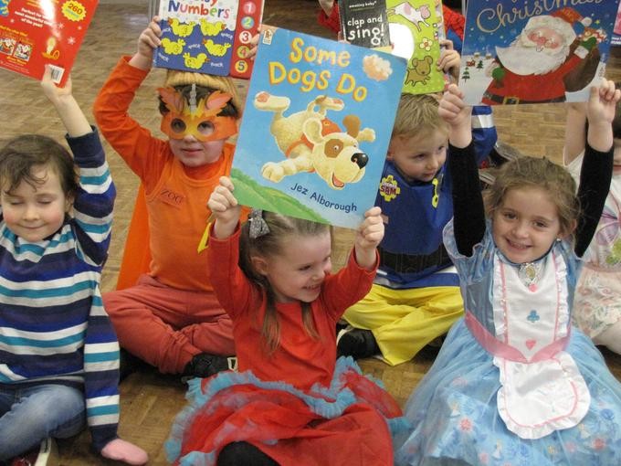Happy children with reading books